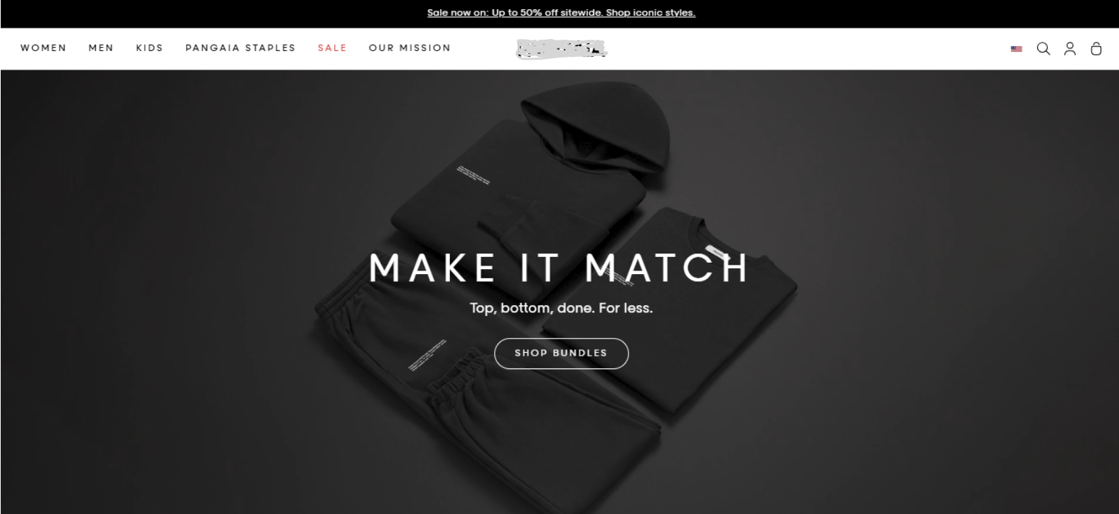 Главная страница магазина базовой одежды на Shopify с промо комплектов