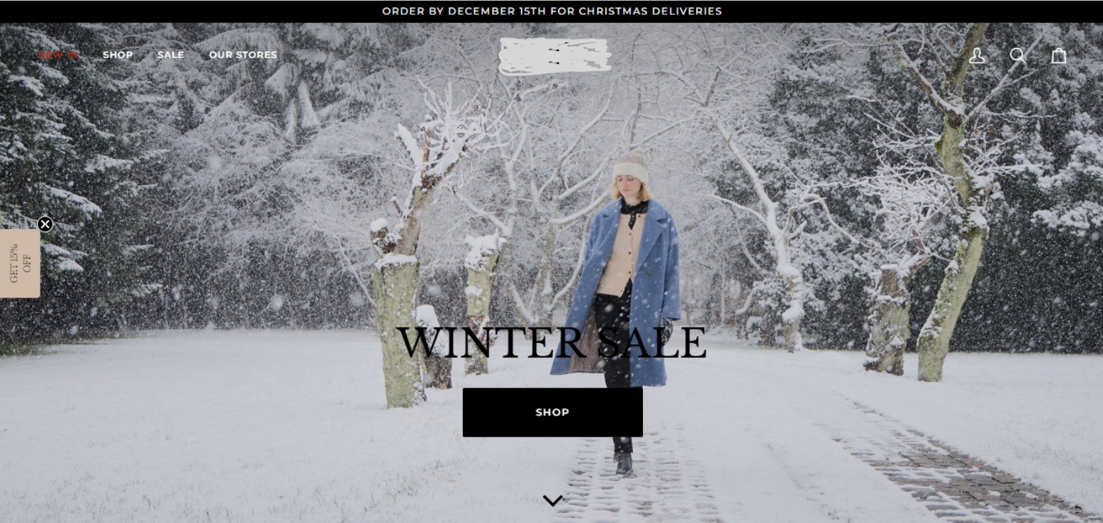 Главная страница интернет-магазина одежды на Shopify: сезонная кампания Winter Sale